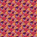 Abstract pattern of triangle shapes in different sizes with random colourfulness in yellow, apricot, red and purple Royalty Free Stock Photo