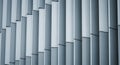 Abstract Pattern of Vertical Gray and White Panels on a Building Facade texture Royalty Free Stock Photo