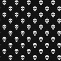 Abstract pattern. White skulls on a black background. Death in the dark. Vector illustration in a flat style