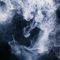 Abstract pattern of white smoke on a black background. Waves of mist and clouds. Royalty Free Stock Photo