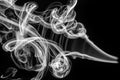 Abstract pattern: white smoke swirls and curves Royalty Free Stock Photo