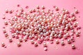 abstract Pearl confetti on pink background