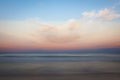 Long exposure photo at the beach at dusk with a beautiful, peaceful, dreamy scene Royalty Free Stock Photo