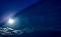 Abstract photo of a blue sky with clouds and sun seen from a half-open window Royalty Free Stock Photo