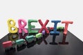 Abstract photo of goods import after Brexit. Line of trucks made of plasticine Royalty Free Stock Photo