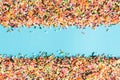 Abstract picture of colorful topping sugar.topping sugar sprinkles on blue background