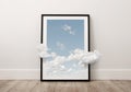 Clouds coming out of the picture frame Royalty Free Stock Photo