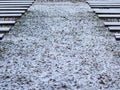 Abstract picture with snowy benches