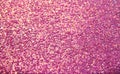 Abstract pink bright background with multicolored sparkles