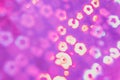 Abstract pink flowers glitter bokeh background