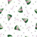 Abstract pink and green christmas trees, candy sticks and dots on white background. Seamless repeat pattern for christmas holidays Royalty Free Stock Photo