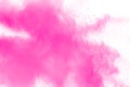 Abstract pink powder explosion on white background. Royalty Free Stock Photo