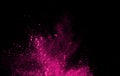 Abstract pink powder splatted background,Freeze motion of color Royalty Free Stock Photo