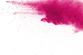 Abstract pink powder splatted background,Freeze motion of color powder exploding/throwing color powder,color glitter texture on wh Royalty Free Stock Photo