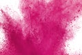 Abstract pink powder splatted background,Freeze motion of color powder exploding/throwing color powder,color glitter texture on wh Royalty Free Stock Photo