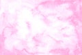 Abstract pink watercolor background. Color splashing on paper. Aquarelle texture. Handmade original wallpaper