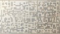 Abstract pixelated mosaic background featuring a complex grid pattern of varying light brown, beige, and grey rectangular shapes, Royalty Free Stock Photo