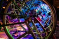 Abstract play of light with lights in bicycle wheel spokes. Royalty Free Stock Photo