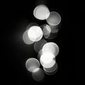 Abstract Play of Light and Shapes Creating a Dramatic Effect with Circular Bokeh Over a Dark Background Royalty Free Stock Photo