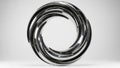Abstract polished chrome metallic ring sculpture with swirling internal curves against a light gray studio background Royalty Free Stock Photo