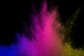 Abstract powder splatted background. Colorful powder explosion on black background. Colored cloud. Colorful dust explode. Paint Ho Royalty Free Stock Photo