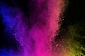 Abstract powder splatted background. Colorful powder explosion on black background. Colored cloud. Colorful dust explode. Paint Ho Royalty Free Stock Photo