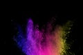 Abstract powder splatted background. Colorful powder explosion on black background. Colored cloud. Colorful dust explode. Paint Ho Royalty Free Stock Photo