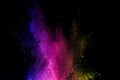 Abstract powder splatted background. Colorful powder explosion on black background. Colored cloud. Colorful dust explode. Paint Ho Royalty Free Stock Photo
