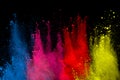 Abstract powder splatted background. Colorful powder explosion on black background. Colored cloud. Colorful dust explode. Paint Ho Royalty Free Stock Photo