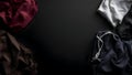 Abstract presentation of different types of clothes on dark background Royalty Free Stock Photo