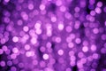 Abstract purple background with night bokeh lights. Illuminated backgrounds. Blurred backdrop, glowing texture, defocused boke.