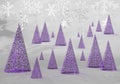 Abstract purple christmas trees on a background of snowflakes Royalty Free Stock Photo