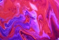 Abstract purple-orange background with iridescent paint. Royalty Free Stock Photo