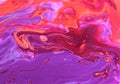 Abstract purple-orange background with iridescent paint. Royalty Free Stock Photo