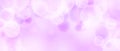 Abstract purple pink circle bokeh wallpaper. Smooth soft blur effect background. Shiny blurry light sparkles texture Royalty Free Stock Photo