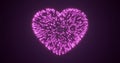 Abstract purple pink fireworks festive fireworks for valentine`s day in the shape of a heart from glowing particles and magical Royalty Free Stock Photo