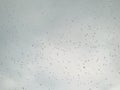 Abstract, Rain drops on car glass with blurred background. Royalty Free Stock Photo