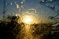 Abstract Rain on glass while driving west in the sunset Royalty Free Stock Photo