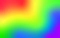 Abstract rainbow background with a smooth, blurry color transition.