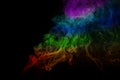 Abstract rainbow color smoke on black background Royalty Free Stock Photo