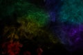 Abstract rainbow color smoke on black background Royalty Free Stock Photo