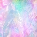 Abstract rainbow holographic foil texture. Trendy magic background with pastel colours