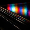 Abstract Rainbow Reflections on Textured Surface Royalty Free Stock Photo