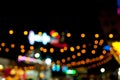 Abstract random colourful defocused blurred background pattern night life of local market