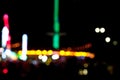 Abstract random colourful defocused blurred night life of fun fair background pattern