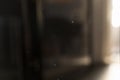 Abstract real blurred background of living room with window light and floating dust Royalty Free Stock Photo