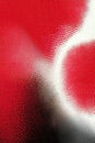 Abstract red background with halftone pattern creating dynamic wavy shapes Royalty Free Stock Photo