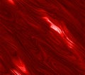 Abstract red background showing a liquid texture with glossy highlights and flowing patterns visible Royalty Free Stock Photo