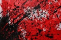 Abstract red and black paint splatter on canvas Royalty Free Stock Photo