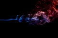 Abstract red blue smoke from aromatic sticks. Royalty Free Stock Photo